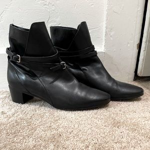 Black leather wrap-around adjustable strap boots